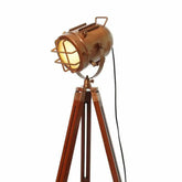 Antiqued copper tripod spotlight floor lamp